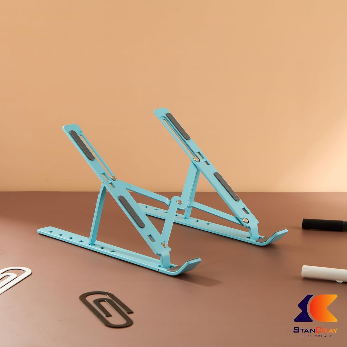 Adjustable Metal Laptop Stand – Foldable Ergonomic Riser for Desk